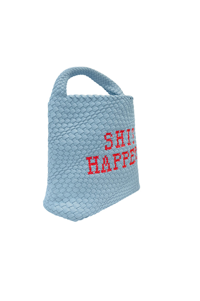 Lilly Loves Shit Happens bucket handbag with drawstring closure and stylish design, shown in natural beige fabric.