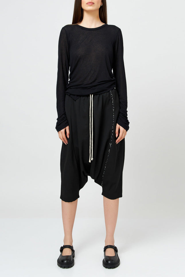 Black Stitched Unisex Harem Trousers
Details :
Black stitched unisex harem trousers 
drawstring-waist trousers 
hand made stitch sewing
side pockets 
elastic waistband can easily fit in between sizes 
PantsAlchemy The LabelAlchemy The LabelBlack Stitched Unisex Harem Trousers