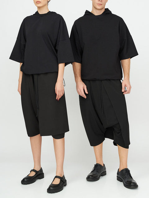Unisex Hooded Top
Details: 
Black cotton T-Shirt
short sleeve 
hood 
ribbed neckline 
adjustable hem 
Composition:

Cotton 96% Elastane 4% 
Washing instructions
Dry Clean Only
FittinShirts & TopsAlchemy The LabelAlchemy The LabelUnisex Hooded Top