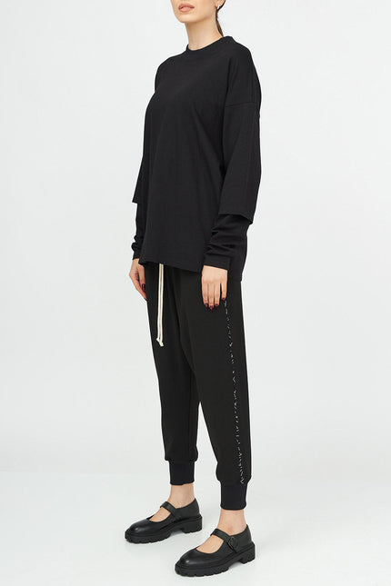Adrogynous Layered Sleeve Top
Details :
Layered sleeve  cotton top 
ribbed neckline
regular fit 
Composition
Cotton 96%, Elastane 4%
Washing instructions
Dry Clean Only
Fitting
Female Model’s meShirts & TopsAlchemy The LabelAlchemy The LabelAdrogynous Layered Sleeve Top
