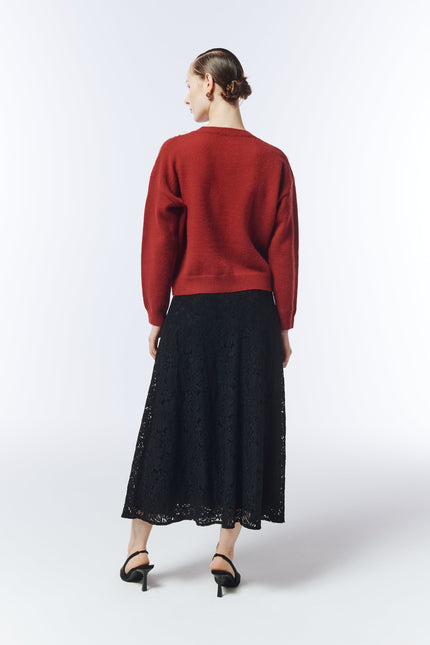 Back view of SOUR FIGS red jumper highlighting relaxed silhouette and ribbed hem.