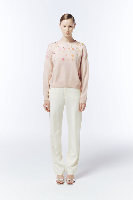 Model wearing SOUR FIGS Iridescent Sequin-Embellished Jumper in Tropical Peach Pink
