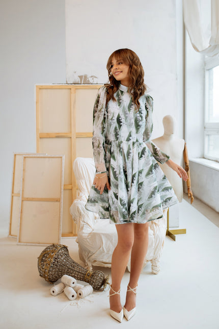 Model in the Lily of the Valley dress, showing the movement and soft flow of the midi-length skirt.