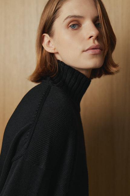 Women's minimalist black merino sweater