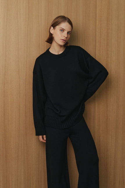 Women's black knitted crew neck sweater