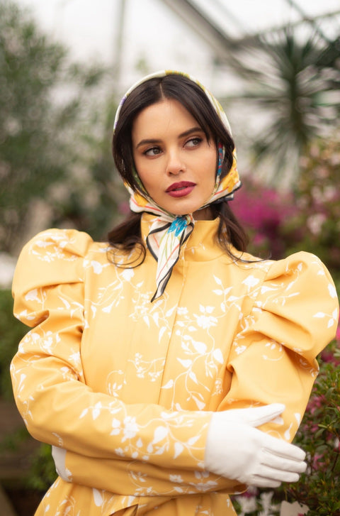 RainSisters | Fitted and Flared Coat with Balloon-Styled Sleeves in Yellow with White Floral Print 'Majestic Yellow'