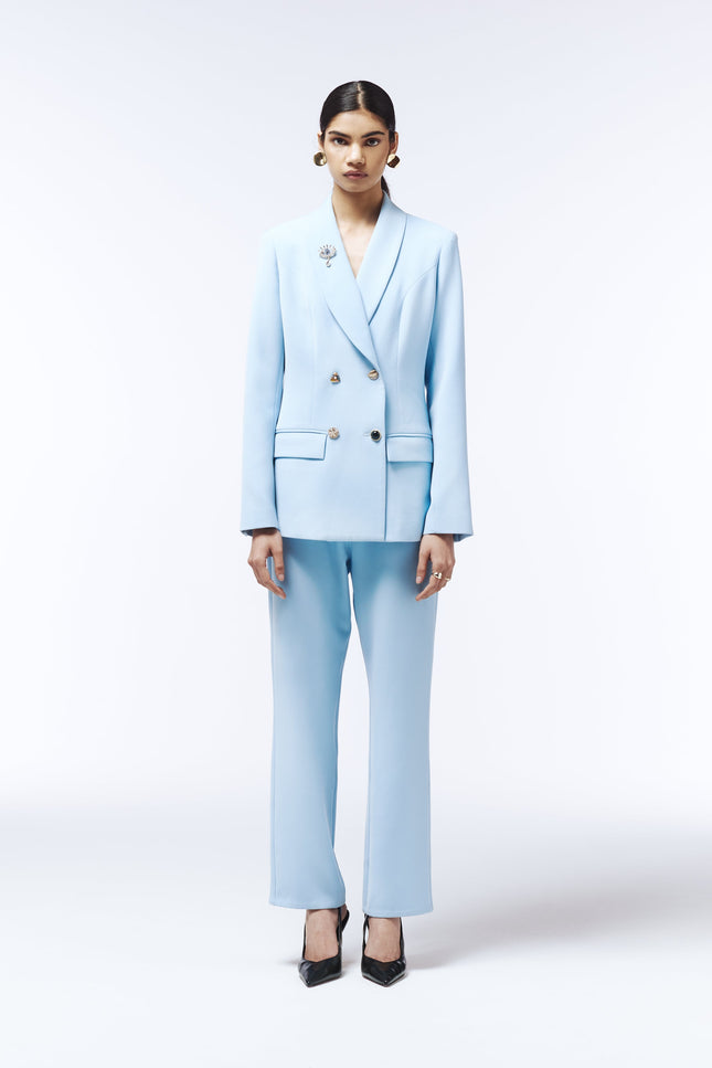 Front view of high-rise blue tailored trousers with straight-leg cut.