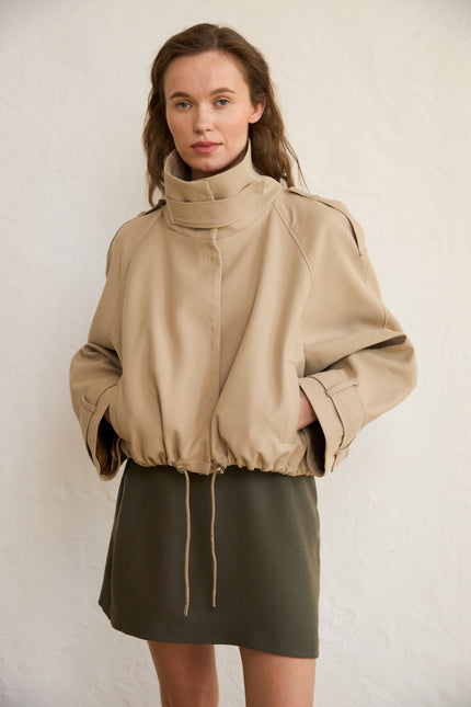 Mini Woolen Skirt with dual side zippers blends modern style, comfort, and versatility. Made from lightweight, breathable wool, it's perfect for spring, summer, and warm autumn days. The mini length adds a bold, contemporary feel, while the functional zippers on each side allow you to adjust the silhouette to suit your style or mood.