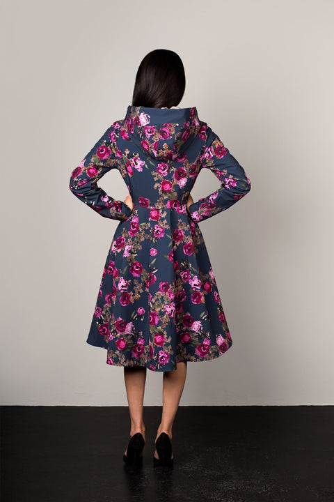 Back view of elegant Misty Rose coat – tailored fit with feminine silhouette and flared hem