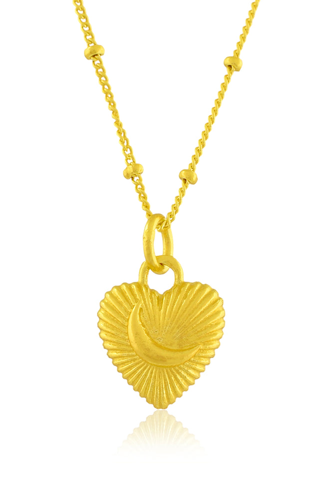 Gold heart-shaped pendant necklace on a white background