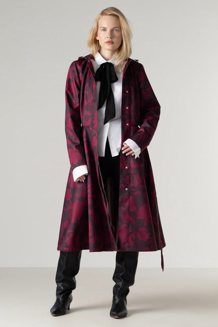 Women's burgundy floral coat opened to reveal luxurious ashy pink Italian satin lining and a full circle skirt.