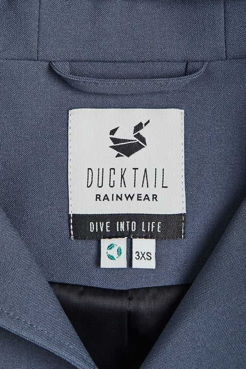 Ducktail Rainwear I SZARY PŁASZCZ PRZECIWDESZCZOWY Z ROZKLOSZOWANIEM - materiały z recyklingu