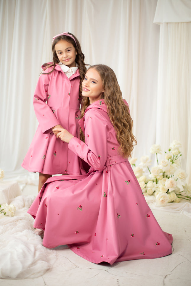 Girl's soft pink color coat with a full circle skirt and the same woman's coat
