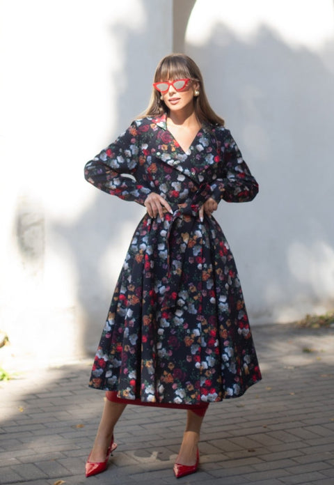 Front view of Rose Garden coat by RainSisters – black waterproof coat with colorful vintage rose print and double-breasted design