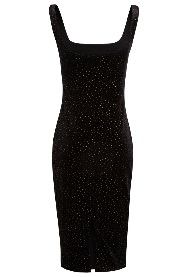 The Black Polka Dot Dress by Sarvin is a sleeveless, knee-length velvet dress featuring a square neckline, polka dots, and a small front hem vent—an elegant pick for any wedding guest.