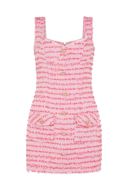 Pink tweed mini dress with frayed trim, a V-neckline, gold-tone buttons, and front flap pockets, designed for a chic and timeless look.