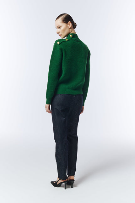 Back view of pine green jumper with relaxed fit and ribbed hem.