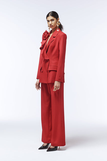 Side view of SOUR FIGS vivid burgundy tailored trousers showing clean high-waisted fit.