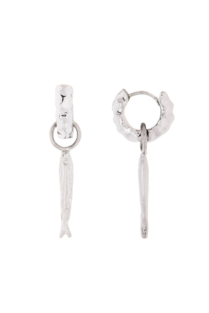Pair of silver hoop earrings with dangling Fish  on a White background
