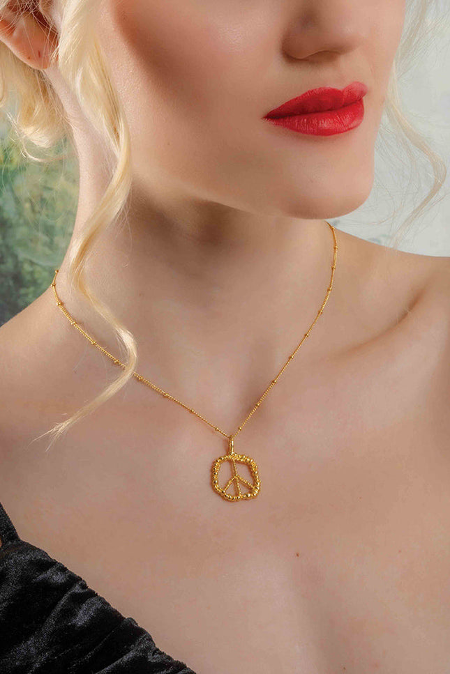 Model wearing Silver Granulated Harmony Necklace by arvino.