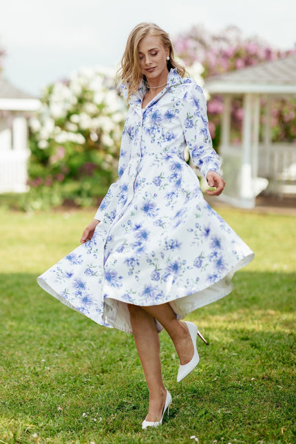 fitted and flared coat in white with flower print