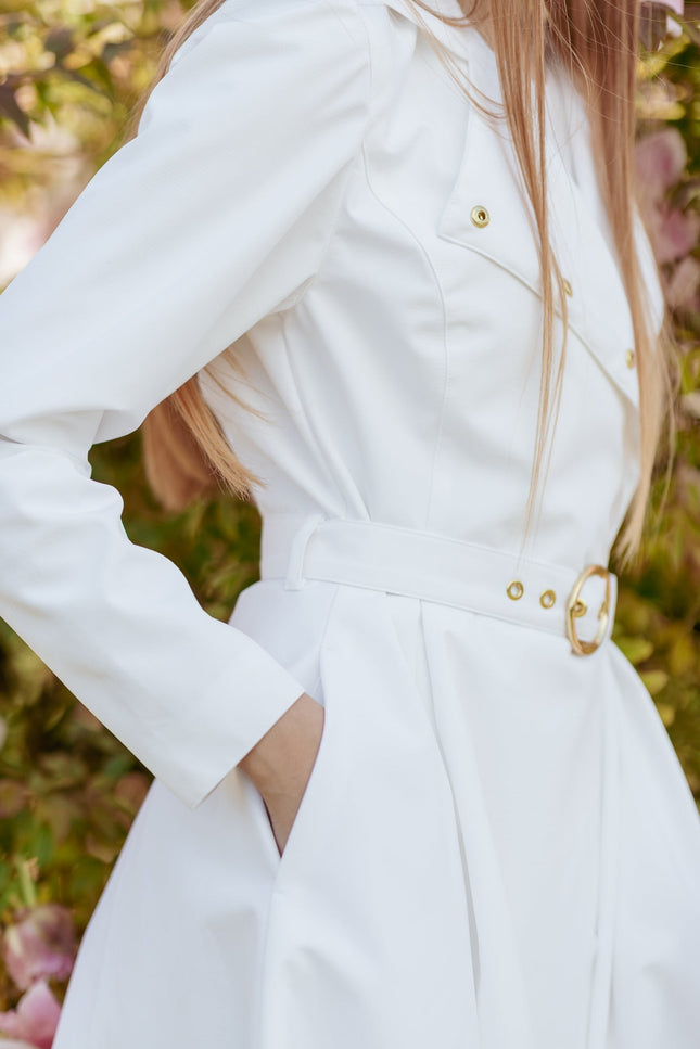 Double breasted coat in white from side view