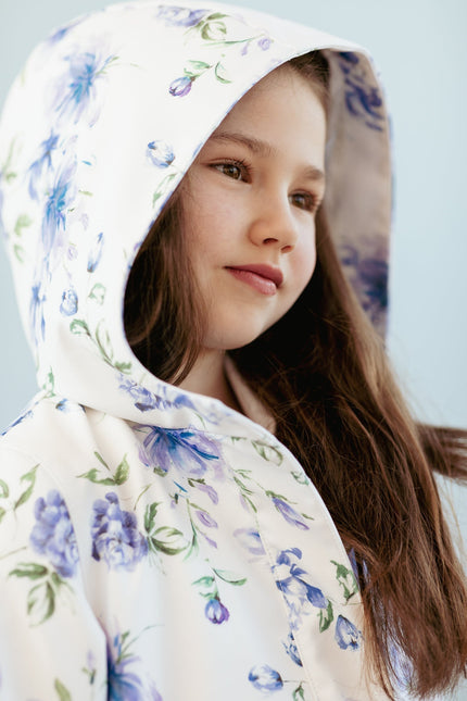 RainSisters | White Trapeze Coat for Girls with Blue Flower Print 'Floral Dream'