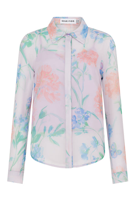 SOUR FIGS romantic printed blouse with slip top, curved hemline, buttoned cuffs and pastel wildflower artwork.
