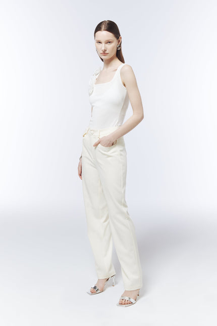 SOUR FIGS fitted ribbed tank top featuring white rose appliqués along one shoulder.