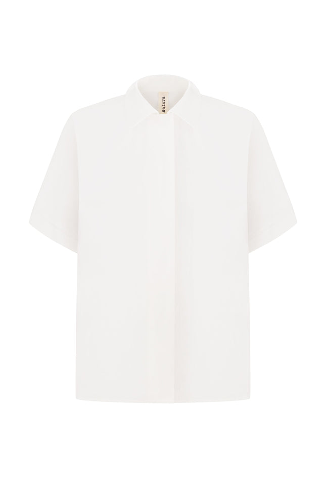 A white, short-sleeved men's shirt with a hidden bar and a button-up neck.