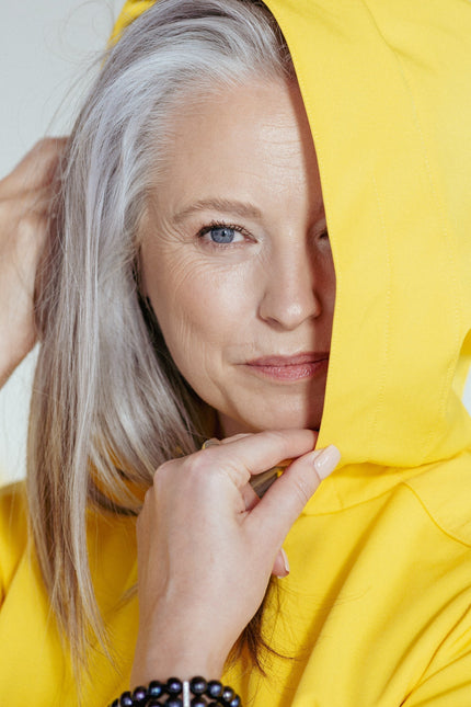 Close-up of light pink Italian satin lining inside Yellow Sun coat – soft and luxurious detail.