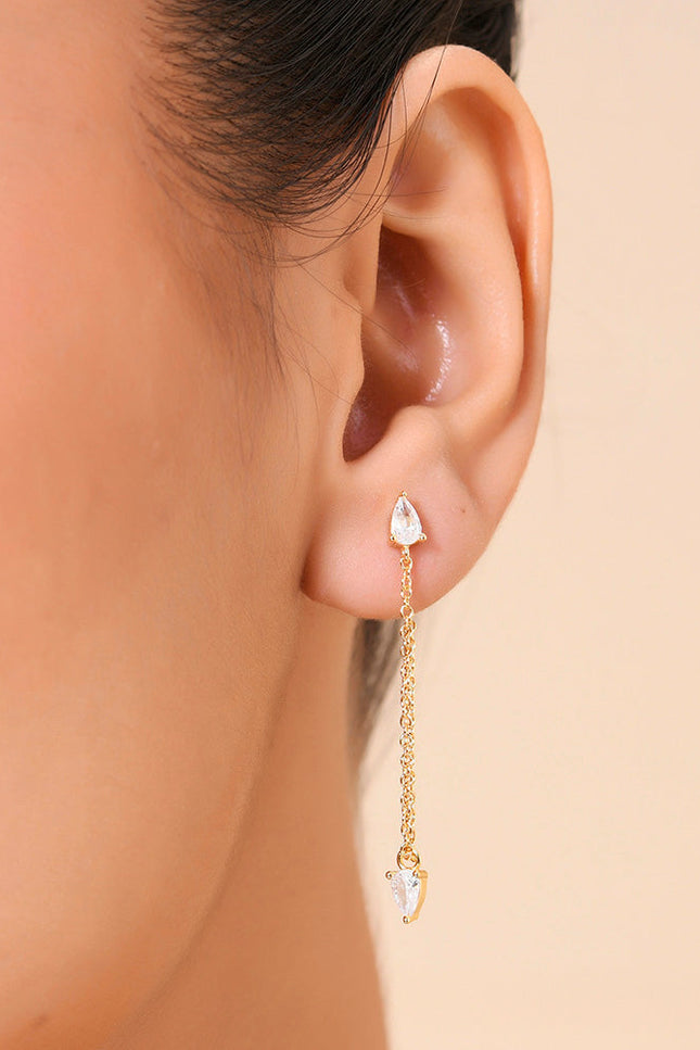 Close image of a model face wearing Zircon Drop Stud Earrings by arvino