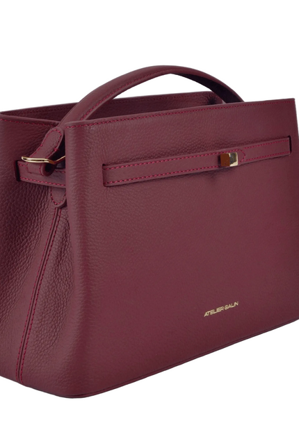 red leather atelier galin handbag with gold cube clasp