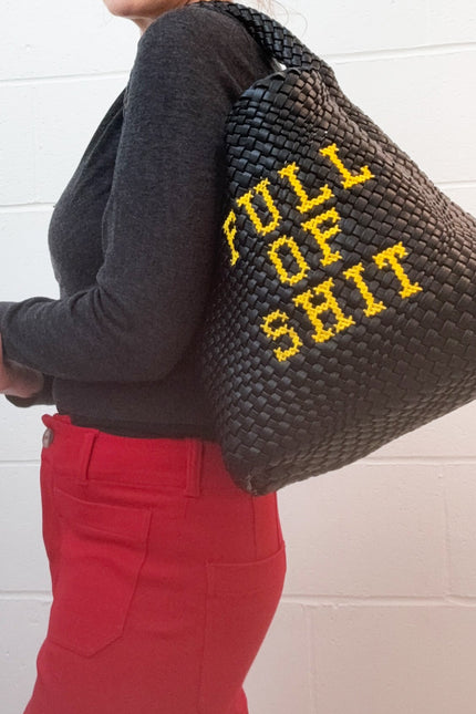 Black embroidered bucket bag by Lilly Loves, stylish bag with intricate embroidery and spacious interior for travel and daily use.