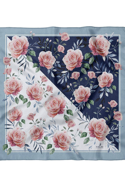 100% pure silk square scarf featuring a modern diagonal color-block design of pure white and midnight blue with watercolor pink roses and blue leaves, flat lay view.