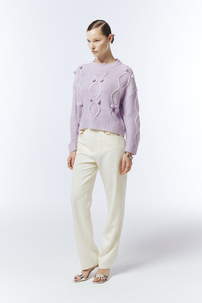 SOUR FIGS soft lilac textured knit jumper, three-quarter model view showing dropped shoulders and ribbed hem.
