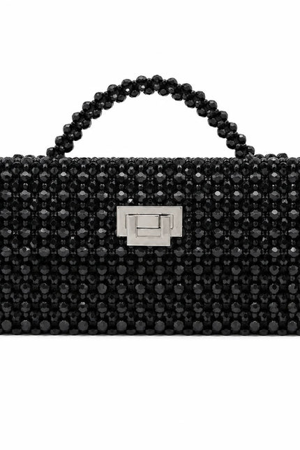 Atelier Emine Panna Deep handcrafted crystal bag from the Crystal Gelato Couture series, featuring a crystal stone handle and couture turn-lock closure.