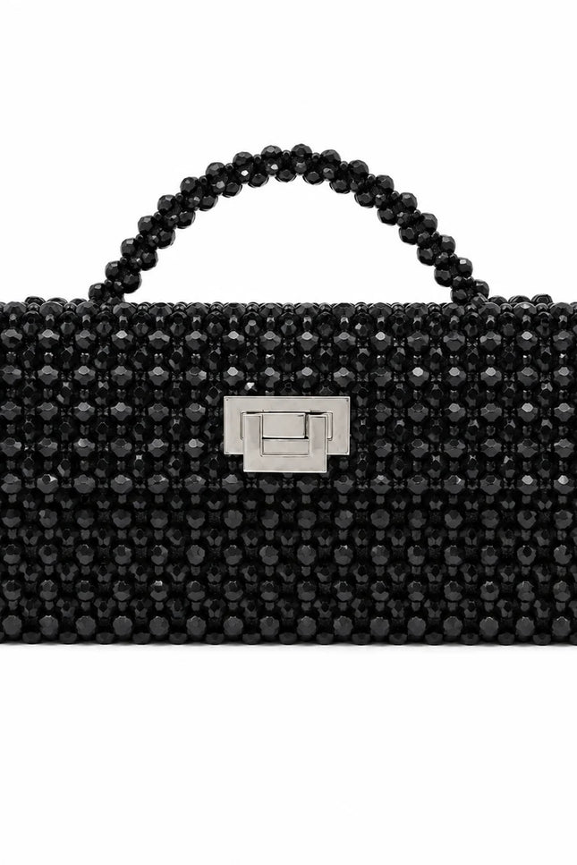 Atelier Emine Panna Deep handcrafted crystal bag from the Crystal Gelato Couture series, featuring a crystal stone handle and couture turn-lock closure.