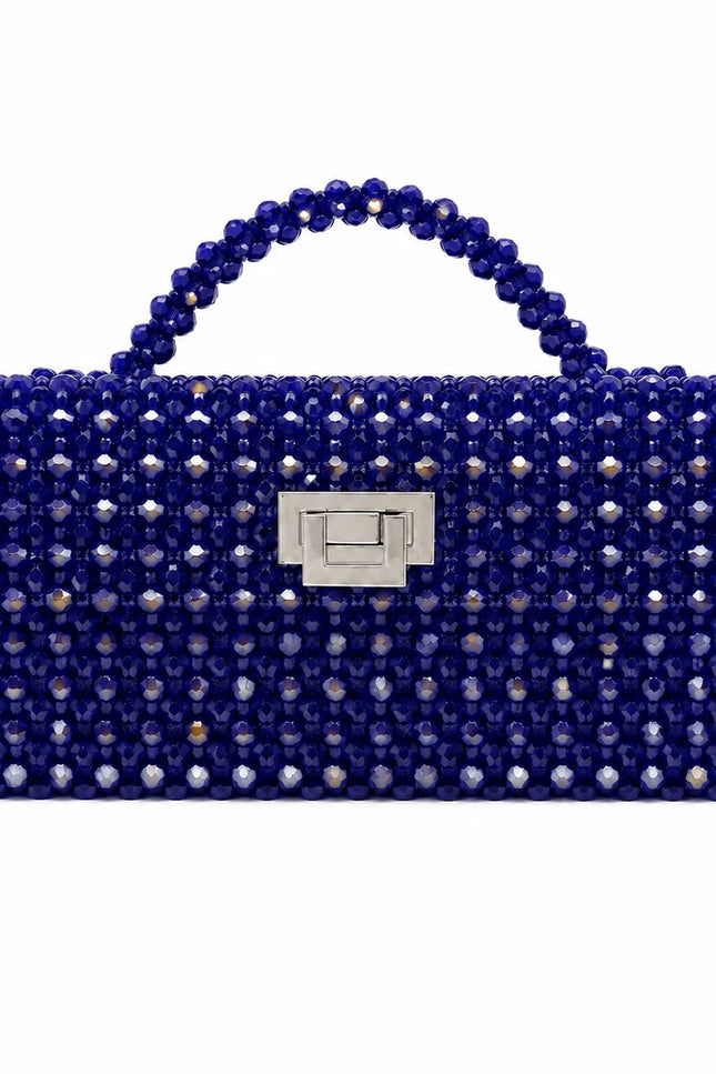 Atelier Emine Panna Navy handcrafted crystal bag from the Crystal Gelato Couture series, featuring a crystal stone handle and couture turn-lock closure.