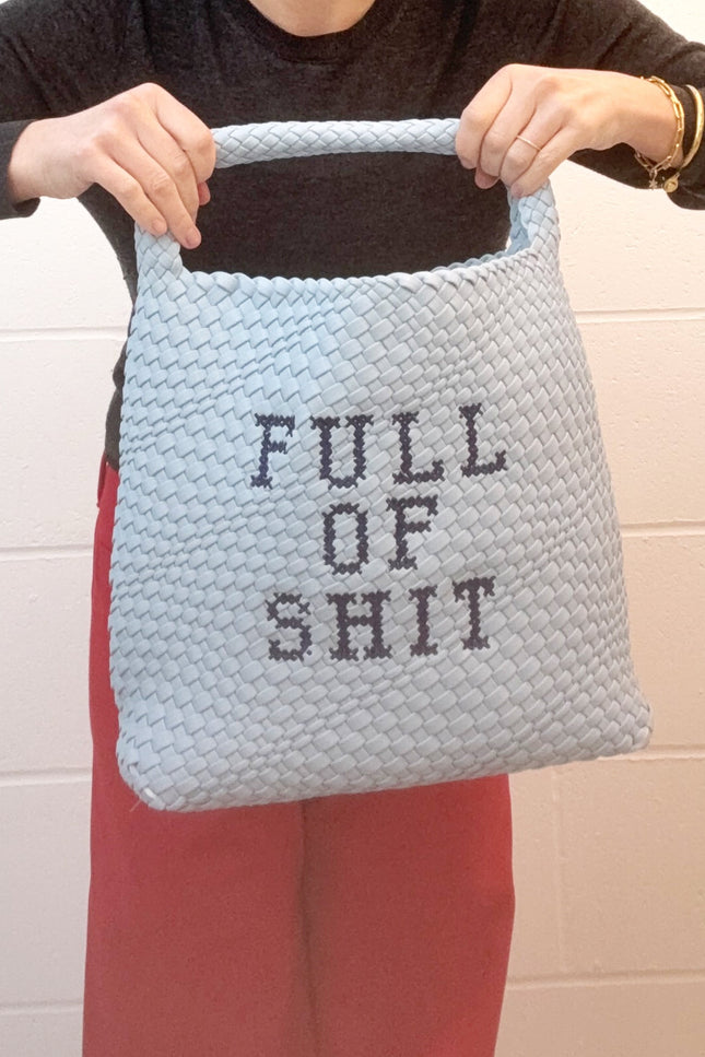 Blue embroidered bucket bag by Lilly Loves, stylish bag with intricate embroidery and spacious interior for organization.