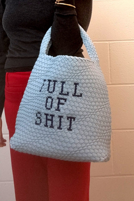 Blue embroidered bucket bag by Lilly Loves, stylish bag with intricate embroidery and spacious interior for organization.