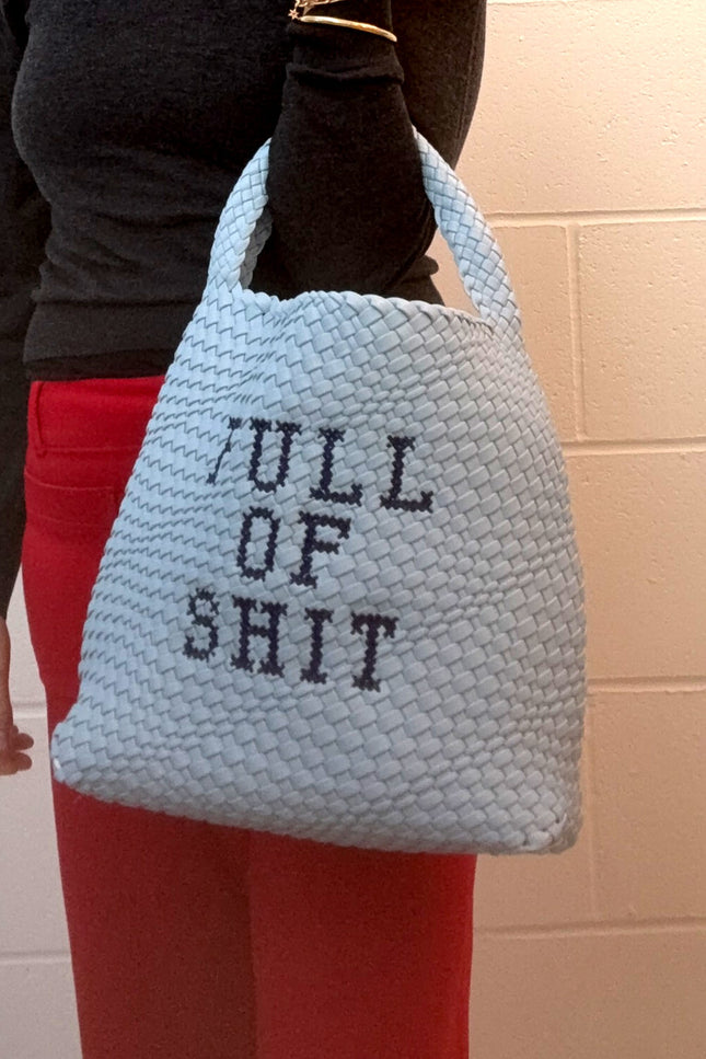 Blue embroidered bucket bag by Lilly Loves, stylish bag with intricate embroidery and spacious interior for organization.
