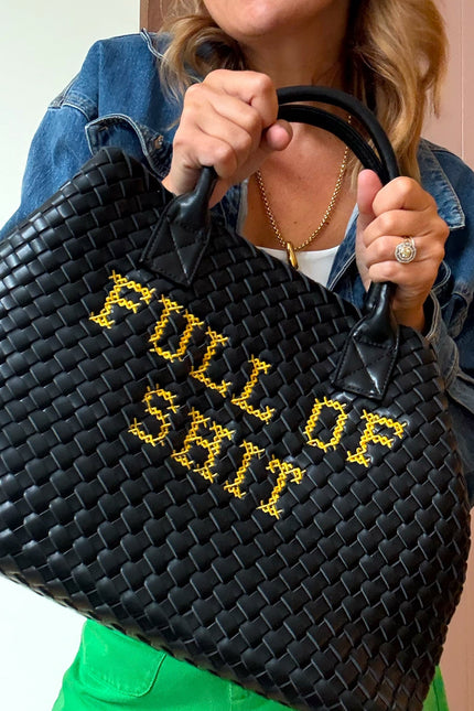 Vegan woven handbag by Lilly Loves with a colorful, textured design and sturdy handles, perfect for casual or stylish outings.