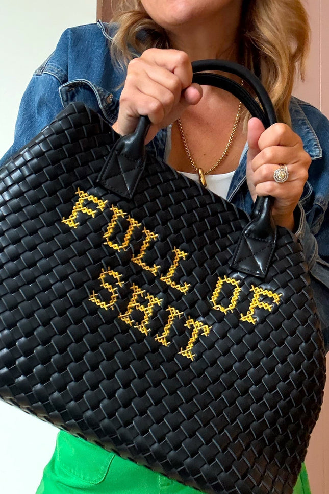 Vegan woven handbag by Lilly Loves with a colorful, textured design and sturdy handles, perfect for casual or stylish outings.