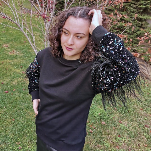 Lalipop Design | Shimmering Sequin Sleeve Sweatshirt with Black Faux Feathers