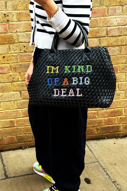 Lilly Loves "I'm Kind Of A Big Deal" handbag with bold text design, stylish accessory for casual or dressy outfits.