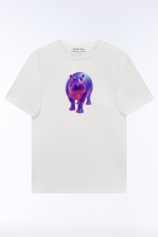 Front view of the SOUR FIGS Iridescent Hippo Print Unisex T-Shirt in White, with a purple, blue and pink hippopotamus graphic and crew neckline.