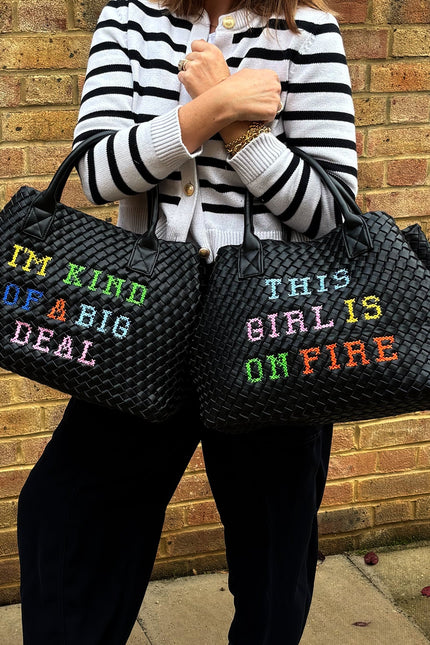 Lilly Loves I'm Kind Of A Big Deal handbag in black with bold white text, featuring a structured design and top handle.