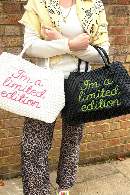 Limited edition white handbag by Lilly Loves, featuring a stylish design and elegant craftsmanship.