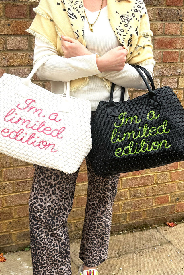 Limited edition white handbag by Lilly Loves, featuring a stylish design and elegant craftsmanship.